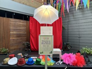 Contact details displayed for booking a photo booth.